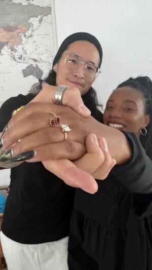 Imani Hakim Instagram - Greatest thing is to love and be loved in return. So here’s to a lifetime of loving cause we ENGAGED! 💍 

Months of planning and secret phone calls led to one magical afternoon, and fortunately, she had no idea 😮‍💨 

Endless amount of you thank you’s to everyone who came out to surprise the tears out of our bride to be. An even bigger thank you to the three sisters who were absolutely vital in keeping this occasion under wraps and organized and beautiful and blessed (🫶🏼 to @ashlyburch, @summermariethomas, @xolovechloe). We know we couldn’t celebrate with everyone so we can’t wait to see many of yall in the near future! 

We’re grateful for the love. We know the journey ahead will be filled with unknowns. And we’re lucky asf to do it together. Lock in girly bean.

🎵Ophelia Wilde - perfect love