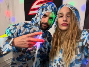 Jemima Kirke Instagram - Friday night paint balling with my brother in law @pennbadgley who couldn’t stop doing this in the pics. I got hit on my pinkie knuckle and he got fatigued after one round. So we sat out the rest of the game, eating the kids pizza crusts, talking about podcasts.