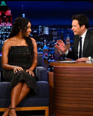 Jessica Williams Instagram - Fallon tonight talking Shrinking (and learning guitar I guess)  And my parents flew in because my Dad is obsessed with Fallon(and me?)! Thank you for having us! I feel so grateful and lucky to be able to talk about this gorgeous show I get to be small part of! Happy Holidaze Willinatorz! 

❤️THANK YOU TEAM ❤️
Makeup// @rebeccarestrepo 
Hair// @lacyredway 
Stylist// @sarahslutsky 
Stylist assistant// @carlee___ 

👗: @milly
👠 : @inez
👛 : @giarite
💎 : @grownbrilliance @mirakijewel @nadrijewelry
 @wearcommando