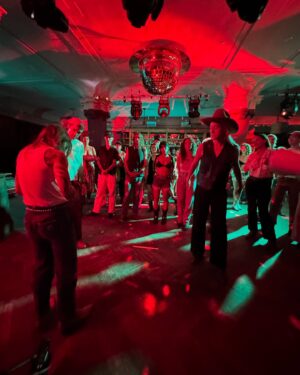Julien Baker Instagram - We were really honored the @stud.country folks were willing to have fun with us and prepare this line dance for the song! Everyone involved is so talented and they were patient and sweet with us while we learned the moves. For us it’s particularly special to find someplace and some people to do cowboy shit with here in NYC.

Watch the music video and listen to “Sugar in the Tank” at the link in bio.

Photos by nicole & @morbidtheclown