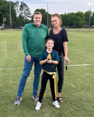 Kathryn Dennis Instagram - When your kiddo nails a touchdown and busts out the Madden victory dance. 🕺🏈 Proud mom with my little champ and his biggest fans. #MaddenMoves #FlagFootballFun