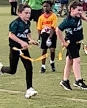 Kathryn Dennis Instagram - When your kiddo nails a touchdown and busts out the Madden victory dance. 🕺🏈 Proud mom with my little champ and his biggest fans. #MaddenMoves #FlagFootballFun