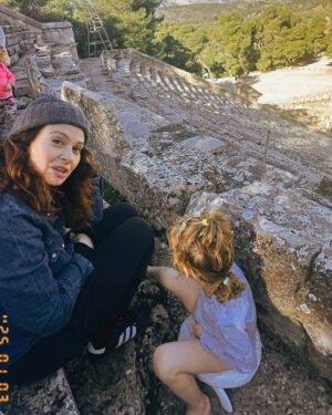 Katie Lowes Instagram - Theatre is my happy place. Getting to see the Theatre of Dionysus where every Greek tragedy/comedy was first performed made me verklempt. Seeing the Odeon of Herodes Atticus where musicals were first performed made @shappyshaps start singing Joseph because of course. And then visiting the Ancient Theatre at the Asklepieion of Epidaurus and standing center stage and being able to speak in a whisper that could be heard in the last row was glorious. And then to whip out the travel potty and hang with my daughter was classic mom travel stuff that I live for. Greece has totally rocked our world.