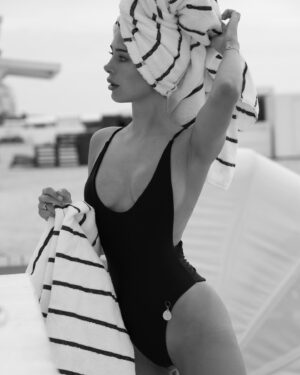 Kimberley Garner Instagram - It’s the high rise with the little cut outs at the sides, classic one piece designed by me 🎬 @kimberleylondon
