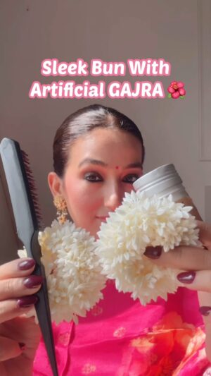Kiwi Tandon Instagram - Sleek bun looks chic , classic and most comfortable and best for bad hair days ✌️infact it easy to make when your hair are greasy and dirty :) 
Just need 3 products and you are done 👍 

Save this 🌸
This brush is must if u want best results and wax stick is so so good amd reasonable also & u guys love it too . If you want any product information let me know . 

Also I have long face so I just took little middle part . If u have small round face then u can go with longer middle part . 

(Sleek hairstyles, sleek buns, sleek hair , hair products , karwachauth hairstyles , chic hairstyles, office hairstyles, amazon finds , work hairstyles, festive hairstyles) 
#hairwax #hairtutorial #sleekbun #sleekhairstyles #sleekhair #sleekhairdo #sleekhairlook #festivalhair #festivalhairstyles #karwachauthlook #kurtasets #gajrahairstyle #hairdos #hairstyleideas #indianhairstyles #kurtasets #grwm #explorereels #festivallook #festivalmakeup #brownhaircolor #wavyhairstyle #wavyhair
