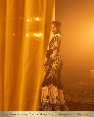 Krithika Babu Instagram - When tradition takes a step into the avant-garde.

The Aadrika Top, with its intricate black beadwork, pairs flawlessly with the dramatic Taarika Ghaghra. This ensemble blends vintage glamour with bold, contemporary design—a flowing, layered silhouette perfect for evening wear or making a statement at grand celebrations.

Experience timeless appeal at www.houseofthreestudio.com or book an appointment  91 89518 84748 to see it in person.

Model @krithikababu

Photographer @abinvrghz

Stylist @queenandro_

Jewellery @bhimagold.official

Carpets @carpetkingdomindia

Creative direction @sounaksenbarat
@anushyamsundar
@houseofthreestudio

Decor @houseofthreeinteriors
Produced by @nevrmint.productions
.
.
#aratrika #eveningwear #fashion #design #luxury #bangalore #partywear #party