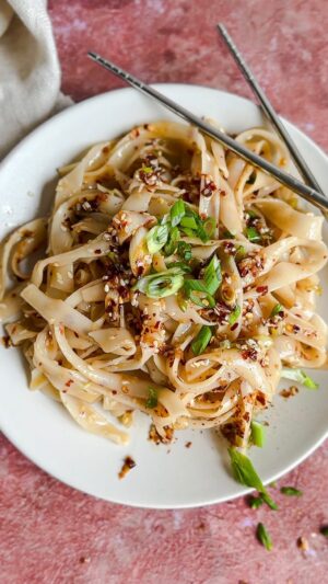 Laura Vitale Instagram - These 10 minute chili garlic noodles is a top favorite recipe in this household and for good reason! Quick, easy and versatile ! I often add ground pork (about half a pound cooked) or seared tofu and they are absolutely SENSATIONAL!!!!!! You have to give them a try, couldn’t be easier! Comment NOODLES (no other character next to it) and I’ll dm you the recipe and if you’re watching this on FB, the recipe is linked in comments. They are THAT good!!