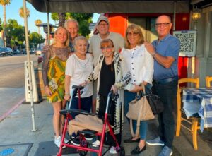 Lea Thompson Instagram - This is a week. Our beloved matriarch Pam had a stroke and passed away a few days later and before we could completely comprehend, the tragedy of the LA fires overwhelmed us.  Today we laid her to rest. My mother-in-law lived with us for the better part of 10 years. We took care of her many heath needs and she listened to our stories. And I will miss her for the rest of my life. She was a survivor of scleroderma, cancer, sepsis, blood clots, heart problems and wounds. But her spirit kept us on our toes. Her humor made her so lovable. As you can see she had a loving family and we are so grateful she got out before LA caught on fire. Mother of my husband. Grandmother to my fierce daughters. I hope you know you left your mark, Pam. You were loved.