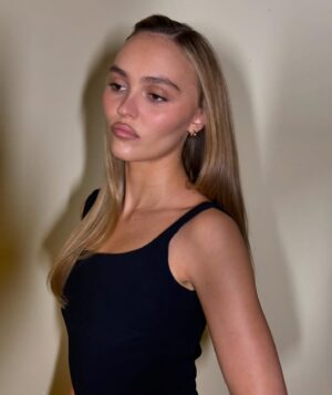 Lily-Rose Depp Instagram - A moment for the press looks <3 aka an excuse to play dress up with @jenny.shoo.pumps @ninapark @brycescarlett 🩵💛🩷 & …. A little reminder that @nosferatuthefilm is out in theaters TOMORROW, December 25th!!!! Merry merry 😘