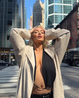 Lindsey Pelas Instagram - running around in minimal clothing... per usual 

@christiaanmikey @madridglow select styles  @manuabddalla