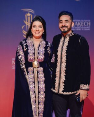 Mounia Lamkimel Instagram - @marrakechfilmfestival 
مع العمر @naamanadil 

حطيت الالبوم لي وصلني كااامل حيث ماعرفتش شنو نختار🫣 شكرا بزاااااف @tendancevision 
بغيت نقول شكرا لادارة المهرجان على حفاوة الاستقبال شكراً للاعلام المغربي على التتبع والمساندة 🇲🇦♥️
شكرا العزيزة الغالية @zor.creations  على اللبسة الهماوية لي تمتعت وانا لابساها ورغم الظروف الصحية والانشغالات إلا انك كنتي متمكنة من حرفتك ولبستيني أنا وعادل على أكمل وجه
شكرا من القلب اخويا وصديقي المتميز @halim_barakat_official لي ماكنتيق إلا فيه ولي شرف على الماكياج والشعر فوقت خرااافي وعطى نتيجة حبييييييتها😌♥️