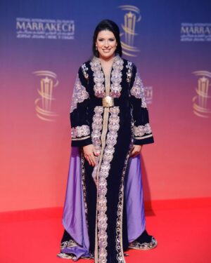 Mounia Lamkimel Instagram - @marrakechfilmfestival 
مع العمر @naamanadil 

حطيت الالبوم لي وصلني كااامل حيث ماعرفتش شنو نختار🫣 شكرا بزاااااف @tendancevision 
بغيت نقول شكرا لادارة المهرجان على حفاوة الاستقبال شكراً للاعلام المغربي على التتبع والمساندة 🇲🇦♥️
شكرا العزيزة الغالية @zor.creations  على اللبسة الهماوية لي تمتعت وانا لابساها ورغم الظروف الصحية والانشغالات إلا انك كنتي متمكنة من حرفتك ولبستيني أنا وعادل على أكمل وجه
شكرا من القلب اخويا وصديقي المتميز @halim_barakat_official لي ماكنتيق إلا فيه ولي شرف على الماكياج والشعر فوقت خرااافي وعطى نتيجة حبييييييتها😌♥️