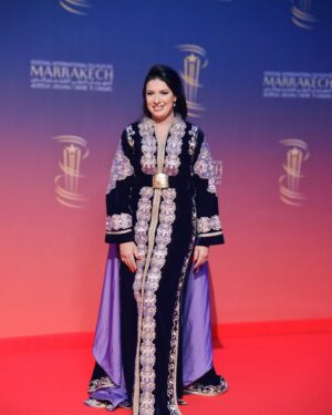Mounia Lamkimel Instagram - @marrakechfilmfestival 
مع العمر @naamanadil 

حطيت الالبوم لي وصلني كااامل حيث ماعرفتش شنو نختار🫣 شكرا بزاااااف @tendancevision 
بغيت نقول شكرا لادارة المهرجان على حفاوة الاستقبال شكراً للاعلام المغربي على التتبع والمساندة 🇲🇦♥️
شكرا العزيزة الغالية @zor.creations  على اللبسة الهماوية لي تمتعت وانا لابساها ورغم الظروف الصحية والانشغالات إلا انك كنتي متمكنة من حرفتك ولبستيني أنا وعادل على أكمل وجه
شكرا من القلب اخويا وصديقي المتميز @halim_barakat_official لي ماكنتيق إلا فيه ولي شرف على الماكياج والشعر فوقت خرااافي وعطى نتيجة حبييييييتها😌♥️