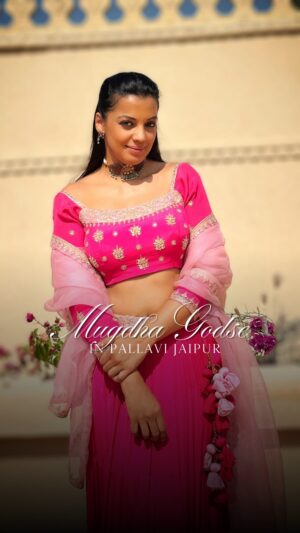 Mugdha Godse Instagram - The effortlessly elegant Mugdha Godse (@mugdhagodse) looks so beautiful in our fuschia lehenga with marori work & organza dupatta. Shop her look to shine through this wedding season!

Gorgeous jewels by- @golecha_jewels 

To shop the look 
📞:  91-8769561711;  91-7568792421
Pune 📞:  91 8956009100
🌎: www.pallavijaipur.com

#PallaviJaipur #FusionIndian #LuxuryWear #Fusionedit 
#SustainableFashion #Homegrown #JaipurDesigner
#celebrityfashion #jaipur #PallaviJaipurPune 
#designerlehenga #lehengaset #weddingwear