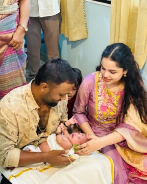 Nakshatra Murthy Instagram - There’s our ☀️ son who hold our hearts 💕 
& we shall call him ⭐️VIYAAN 
.
Noolukettu 🧿♥️
