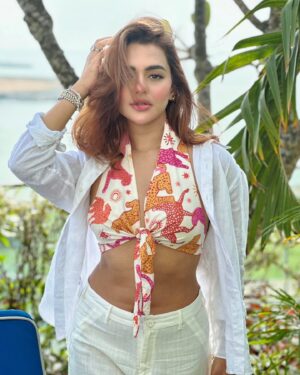 Nusraat Faria Instagram - "Messy hair, glossy stare, and a whole lot of ‘I know I’m fabulous’ energy!"

Hair color by @signature.look.by.samia 
Top by @dotdofficial