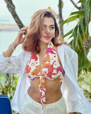 Nusraat Faria Instagram - "Messy hair, glossy stare, and a whole lot of ‘I know I’m fabulous’ energy!"

Hair color by @signature.look.by.samia 
Top by @dotdofficial