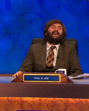 Rachel Riley Instagram - I know, I know. In real life Jimmy’s teeth are far less realistic than this. 

Happy New Year, Happy new Cats Does Countdown! New ep goes out tomorrow, Friday 9pm @channel4 

With Phil Wang, Jon Richardson, Joe Wilkinson, Rosie Jones and John Cooper Clarke in dictionary corner with Susie @wangpix, @jonrichardsoncomedian @gillinghamjoe @josierones @johncooperclarke @susiedent @jimmycarr 

See you soon for the lols 😘🥂

#comedy #catsdown #catscountdown