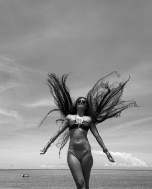 Radhika Bose Instagram - Let it go , let it flow ! 
@yogasini 
#yogasini 
.
.
.
.
#bmw #iphonephotography #hairart #beachvibes #bikini
