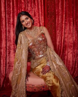 Shereen Sikka Instagram - Radhika Ambani for her Reception in @dolcegabbana Alta Moda Sardegna 2024 and custom @anamikakhanna.in Couture. 
Footwear @aprajitatoorofficial 
Styled with @rheakapoor @sanyakapoor
Glam @bbhiral @loveleen_makeupandhair 
Draped by @dolly.jain 
Style team @meghnadhall @styledbysujata 
@stylebyvanshika 

Pictures by @gregswalesart
