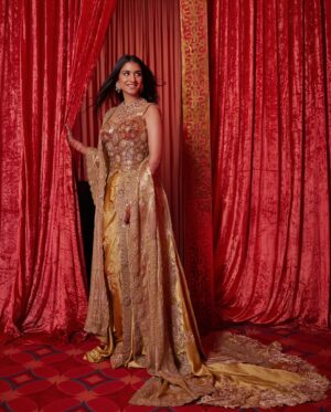 Shereen Sikka Instagram - Radhika Ambani for her Reception in @dolcegabbana Alta Moda Sardegna 2024 and custom @anamikakhanna.in Couture. 
Footwear @aprajitatoorofficial 
Styled with @rheakapoor @sanyakapoor
Glam @bbhiral @loveleen_makeupandhair 
Draped by @dolly.jain 
Style team @meghnadhall @styledbysujata 
@stylebyvanshika 

Pictures by @gregswalesart