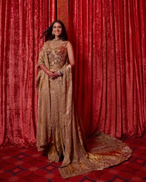 Shereen Sikka Instagram - Radhika Ambani for her Reception in @dolcegabbana Alta Moda Sardegna 2024 and custom @anamikakhanna.in Couture. 
Footwear @aprajitatoorofficial 
Styled with @rheakapoor @sanyakapoor
Glam @bbhiral @loveleen_makeupandhair 
Draped by @dolly.jain 
Style team @meghnadhall @styledbysujata 
@stylebyvanshika 

Pictures by @gregswalesart