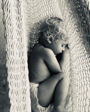 Teresa Palmer Instagram - Forest Sage is 8🫶🐞✨ Our Folly was born 12/12/16 at 12:21pm and was my easiest, quickest and dreamiest birth of the lot! His way in the world is as magic as the way he came in. His superpower is his kindness and humor (and legendary hair!) the things that light him up are animals, being in nature, creating art, making people laugh and being a helper. His ability to play in his own imaginary world for hours on end has always blown us away, he can make a play thing out of any object, anywhere. He’s the first to say sorry, the first to check in if someone is in need and can rip a hole in his pants like no other, he plays hard and loves harder. Forever in awe of you- our adventurous, big hearted, animal loving, wild wonder boy. Happy 8th birthday darling 🌲❤️ #happybirthday