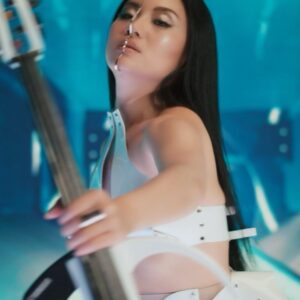 Tina Guo Instagram - MOONHEARTS IN SPACE feat. @serjtankian is out now! 🙏🏼🪐🌓🎶
LYRICS:
I want to know
where you go 
To your home 
That we all live in space

We need to find 
A new way to survive 
And we look up at you
But we’re all in space, 

A hand in the hour of need,
An hour in the need of a drink,
A drink in the body of an addict,
An addict in the body of a child’s mind,
A child’s mind in the need of a father,

Spinning varieties of psycho plastic nonchalant
Star glazers at best. 
A cello, a tangerine field 
Engulfed by fire,

You were undressed
With your lies I confess,
But I don’t want to know,
Cause we’re going to space,

Children, let’s pretend 
We can see everything 
But we can’t,
I can make the pain go away,
No you can’t !

Going to space....

We need to find 
That one thing that defines
What we are to this place
Yet we’re going to space,
Going to space,
Stay in our place,
We’re going to space,
Staying in our place
Going to space
We erase the past,
We erase our mask,

Our fate isn’t determined
By humanity,
Our fate is determined 
By depravity.
