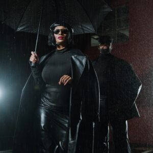 Toccara Jones Instagram - Can you stand the rain? ☂️🌧️
After every storm there’s a rainbow.
Posing in Pairs 🖤🖤
What’s your favorite look?
@iamtoccarajones   @mrdblanks 
Creative direction: @mrdblanks & @passionatechonvill with @pmcmarketing 
Styling: @passionatechonvill 
Editor: @mrdblanks 
Camera operator: @j.paschalphoto 
Production Assitant: @frenchkiss4you 
#toccarajones #derekblanks #contentking #hisandhers #posing
