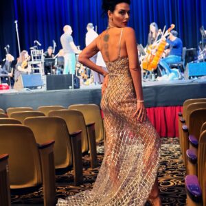 Victoria Unikel Instagram - What a stunning night at the Ebell Theater on Wilshire for an unforgettable classical concert performance by Aleksei Chebeliuk @alekseichebeliuk and a symphonic orchestra! 🎶✨ The atmosphere was exciting and electric, and the performance was wonderful. So happy to support this wonderful event with my companies VUGA Media Group @vugamediagroup and Gossip Stone TV @gossipstone.tv as media sponsors for this incredible event. 

My gorgeous dress that no one could take their eyes off, was created by Anna Gupta @annaguptacouture ♥️ 

Jewellery collection Sunflower by Harry Winston @harrywinston