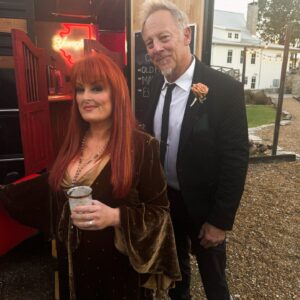 Wynonna Judd Instagram - Camera roll crumbs from 2024. Looking back with a grateful heart!!! 

1- Got to play in Alaska again 🩵
2- Married off the final Moser son 💍
3- The best group to be stuck in an airport with ✈️
4- Sparkles. Duh. ✨
5- Meet Moonshine! 🐮 Kaliyah loves giving him treats!
6- BTS 📸
7- @starletjudd is a really good sport 💕
8- Hazel Claire has already stolen my heart 🎀
9- We love Austin!!! 🎶
10- Ryman selfies with @ashleymcbryde 🤳
11- Farm life. 🐔
12- I 💚 @laineywilson
13- Girls night out @robertswesternworld 🥂
14- Spent time with @officialstetsonwright and his sweet family 🤠
15- Princess Kaliyah’s first time trick or treating! 🎃
16- Boomer.🥤
17- Nonie’s little sous chef. 👩🏼‍🍳
18- First time using my @kubotausa mower. 🚜
19- Cooking in stage clothes. What else is there to do? 🍅
20- No caption needed. 😆🏓