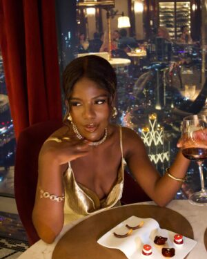 Yolanda Tati Instagram - A Night at the Sky? 🥂☁️ TOP OF THE WORLD, BABY!!! I’M ON TOP OF THE WOOORLDDD… 

Dinner at the highest Restaurant in the whole world was a bucket list thing: so glad we did it together, Amore Mio!!! 🌹 So proud of our growth as a couple: we started from scratch and look how far we’ve got!!! Your Love makes me feel INVINCIBLE ❤️✨

#YolaLovesMarco #MoambaComPizza #Dubai #BurjKhalifa #Couple #CoupleGoals #ootn