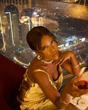 Yolanda Tati Instagram - A Night at the Sky? 🥂☁️ TOP OF THE WORLD, BABY!!! I’M ON TOP OF THE WOOORLDDD… 

Dinner at the highest Restaurant in the whole world was a bucket list thing: so glad we did it together, Amore Mio!!! 🌹 So proud of our growth as a couple: we started from scratch and look how far we’ve got!!! Your Love makes me feel INVINCIBLE ❤️✨

#YolaLovesMarco #MoambaComPizza #Dubai #BurjKhalifa #Couple #CoupleGoals #ootn