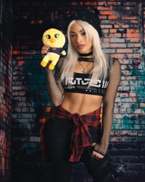 Zelina Vega Instagram - And for the last day of Zelina Vega’s Cosplay Countdown, we get a 3 for 1 special! We got Felix from Stray Kids! Rey Mysterio Jr, Filthy Animals edition! And Team Rocket alongside my amazing podcast hosts @imkingkota and @jdeanwilliams 🫶 *NEW EPISODE OUT NOW, LINK IN BIO* Happy Halloween everyone! Until next time! Biggest thank you to @haleyanne_ @comicbook @yesishootmodels @herhandstyles and everyone who made this possible!