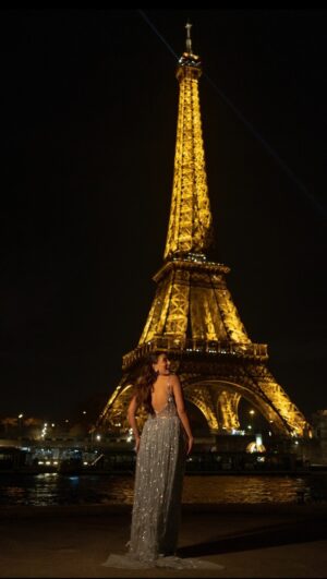Aashi Adani Instagram - ..it’s purely MAGICAL at night 🌜✨ Look 3 at Paris Fashion Week 💃
Wearing:
Gown @poojapeshoriaofficial
Trench @a.la.modebyakanksha
Jewels @thelittlejb_ 
Heels @theorohlife

Styled by @ritikasachdevaa
Styling team @jasslinkaur @thatclichechic

Shot by @harvijay_j
Hair by @auroremar_makup
Makeup by @aashiadani
Assisted by @juliettemorenoruiz