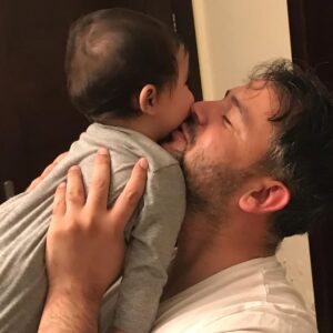 Aisha Uqbah Malik Instagram - Mahnoor following suit.... 7 months old and she s already got baba wrapped around her pinky! 😍 attagirl 👏👏👏Happy 1st Fathers Day Uqbah ...as much as i hate to admit it you know you re her absolute favorite....🙄🙄🙄#babakibeti #uqbahhadeedmalik #mahnooruqbahmalik #fathersday #bestbabaever💙💙💙
