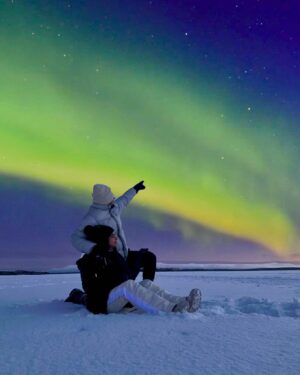Aisha Zafar Khan Instagram - The Northern lights painted the sky with stories we hadn’t heard of yet. We leaned back, letting the colors wash over us and paint new dreams for us to follow 💚💛