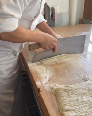Aiste Miseviciute Instagram - Originally from Tokyo, soba master Katsuki Sakurai, the head chef of @yenparisfr, always wanted to live abroad. When the ready-to-wear company he was working for offered for him to move to Paris, he did not hesitate for a second.
To perfect the complex art of making soba, he spent a year working alongside one of the best masters in Japan, Takahashi Kunihiro, as an apprentice in Kyushu. He then moved to Paris, where he has been the head chef at restaurant Yen for over 20 years.
While the process for making soba might appear quite simple at first sight, it demands real technique and expertise. Water and buckwheat are the only ingredients used to make soba noodles; thus, their quality is essential. For his restaurant in Paris, Katsuki Sakurai imports buckwheat from Japan, before mixing it with water and cutting the soba every day.
The speed at which the noodles are cut is also a crucial factor. The best soba will never be too dry, will always be perfectly al dente, and will possess the beautiful flavour of buckwheat.

* The short article written by me was originally published by Pen magazine. @penmagazine @penofficial 
https://pen-online.com/travel/katsuki-sakurai-europes-best-soba-maker/ 

In the pictures:

- Cold soba with sea urchin
- Chutoro and sea bream sashimi
- Fried mochi with bottarga
- Zucchinni flower tempura (when in season)
- Otoro and sea urchin temaki
- Black cod
- Hot soba
