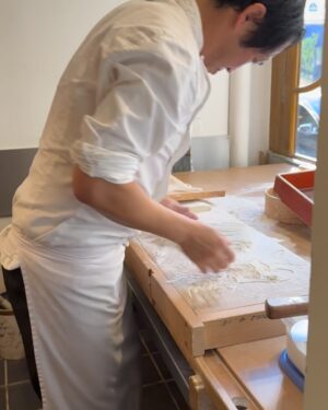 Aiste Miseviciute Instagram - Originally from Tokyo, soba master Katsuki Sakurai, the head chef of @yenparisfr, always wanted to live abroad. When the ready-to-wear company he was working for offered for him to move to Paris, he did not hesitate for a second.
To perfect the complex art of making soba, he spent a year working alongside one of the best masters in Japan, Takahashi Kunihiro, as an apprentice in Kyushu. He then moved to Paris, where he has been the head chef at restaurant Yen for over 20 years.
While the process for making soba might appear quite simple at first sight, it demands real technique and expertise. Water and buckwheat are the only ingredients used to make soba noodles; thus, their quality is essential. For his restaurant in Paris, Katsuki Sakurai imports buckwheat from Japan, before mixing it with water and cutting the soba every day.
The speed at which the noodles are cut is also a crucial factor. The best soba will never be too dry, will always be perfectly al dente, and will possess the beautiful flavour of buckwheat.

* The short article written by me was originally published by Pen magazine. @penmagazine @penofficial 
https://pen-online.com/travel/katsuki-sakurai-europes-best-soba-maker/ 

In the pictures:

- Cold soba with sea urchin
- Chutoro and sea bream sashimi
- Fried mochi with bottarga
- Zucchinni flower tempura (when in season)
- Otoro and sea urchin temaki
- Black cod
- Hot soba