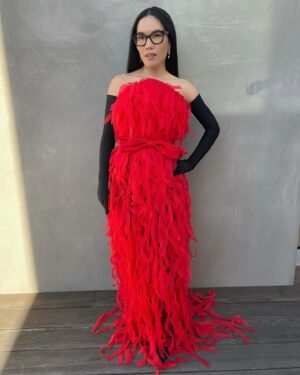 Ali Wong Instagram - The first 🏆 I’ve ever received for a stand up special 😭 🙏 ❤️

Dress, gloves and shoes: @balenciaga 
Earrings: @bpdesilvajewellers 
Styling: @taraswennen 
Makeup: @danielmartin 
Hair: @samiknighthair 
📸 @goldenglobes @gettyimages #goldenglobes