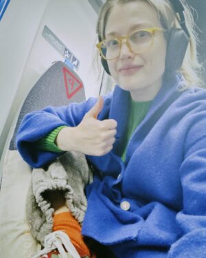 Alison Sudol Instagram - I have an MR🧿 today to bookend the clinical trial I’ve done - the first time I did it I thought for sure I would have a panic attack with all the banging and clanging and having to stay perfectly still. Honestly I would have taken general anesthetic if it had been an option (nevermind that I gave birth with nothing more than gas  air   a comb for pain relief, head in a tube is its own thing) - and my dad and my step mom came with me. But I did it and lived to tell the tale. Today I dressed in every color I could find to combat the greyness of the day and have found it very satisfying that I seem to match my settings well. Fear of the unknown is often the most paralyzing part. I know what I’m getting into today. I know to leave my jewelry at home. No one is with me but I still feel held. I know it will be loud and I know it will take all the breathing tools I have but it will be a half an hour of my life. Being inside the medical system is a constant invitation to soften in the face of fear. I have so much compassion for anyone going through their own health journey. I highly recommend orange socks and something bright and vivid blue because matching and contrasting with hospital bathrooms is a small pleasure one shouldn’t deny oneself. The diazepam is kicking in. Wish me luck x