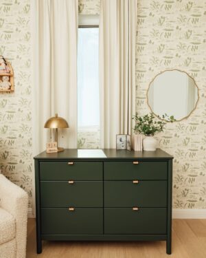 Ally Maki Instagram - Our nursery reveal for little Charlie Rei, designed with @babyletto, is finally here! ✨ Inspired by my grandmother’s garden, I wanted this space to feel warm and whimsical—like stepping into a world where all her adventures, big or small, can unfold.

One of my favorite parts is her Yuzu 8-in-1 Convertible Crib, made with sustainable New Zealand pine wood. It’s been with her since her newborn days, and we’re already getting ready to convert it to her full-size crib. The @chasingpaper wallpaper and deep moody green Bondi Dresser tie it all together, creating a space where her imagination can bloom. Thank you Babyletto for the nursery of our dreams. ♡

Thank you @people magazine!