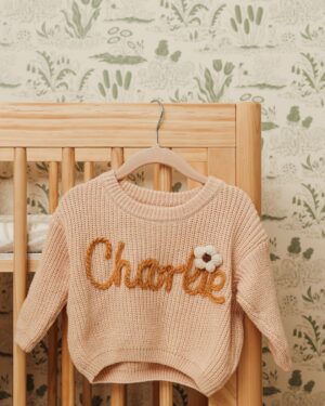 Ally Maki Instagram - Our nursery reveal for little Charlie Rei, designed with @babyletto, is finally here! ✨ Inspired by my grandmother’s garden, I wanted this space to feel warm and whimsical—like stepping into a world where all her adventures, big or small, can unfold.

One of my favorite parts is her Yuzu 8-in-1 Convertible Crib, made with sustainable New Zealand pine wood. It’s been with her since her newborn days, and we’re already getting ready to convert it to her full-size crib. The @chasingpaper wallpaper and deep moody green Bondi Dresser tie it all together, creating a space where her imagination can bloom. Thank you Babyletto for the nursery of our dreams. ♡

Thank you @people magazine!