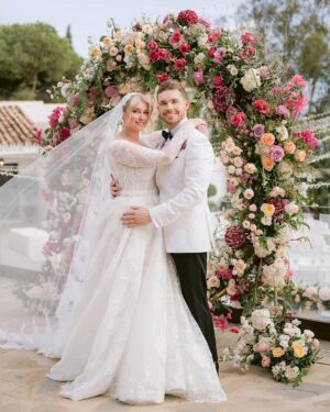 Amy Hart Instagram - Where to even begin?! ❤️

✨ A stunning venue in sunny Spain
✨ Not one, not two but THREE fab dresses
✨ An abundance of live music
✨ A giant conga line ft. 136 guests   1 wedding planner
✨ More rosé consumed than the caterers could keep up with 
✨ A precious little page boy
✨ A wonderful team of suppliers 
✨ A whole lot of love and laughter 
✨ And most of all, a truly fantastic couple ❤️

Thank you @amyhartxo and @samuelrason for being a dream and trusting me with your day ❤️

📸 @bloomfield_wedding_photography 

WP: @weddingsbyemilycharlotte
Assistant Planner: @ddweddings_celebrations
Venue: @casadelaeramarbella
Content Creator: @adore.socials
Flowers & Deco: @uniquebyrobertosilvosa
Video: @reeceivesonvideography
Stationary: @papelosophie
Catering: @alabarderocateringexperiences
Stylist: @jeffmehmet1
Hair: @iamjamesjohnson
Make Up: @marcosgmakeup
Bridesmaid Hair: @alexbridal
Bridesmaid Make Up: @ekaterina_slauta_mua
Bridesmaid Dresses: @rewrittenlondon
Groomsmen suits: @mossbros
Groomsmen bow ties: @debenhams
Celebrant: @malagaminister
Singers: @masqueradeduo @real_arg @melissaccarver @johnnygsinger
Saxophone: saxkidmarbella
Wedding Dress and Veil @zuhairmuradofficial
Earrings @sifjakobsjewellery
Second dress @nadinemerabi
Bow Veil @minamollie
Third dress @modeandaffairebride
Shoes @charlottemillsshoes
Groom’s tux suit, shirt, shoes @hawesandcurtisglobal
Cummerbund @dolcegabbana
.
.
.
.
.
#wedding #weddingplanning #spanishwedding #bride #bridetobe #2025bride #2026bride