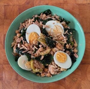 Annabel Crabb Instagram - Salad for an oily-minded pescatarian in need of a protein and iron boost … chickpeas, Sirena chilli tuna, hard boiled egg, cime di rapa, green olives, capers, toasted almonds. Dressing is a basic cigarette with a question mark of mustard