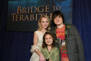 Bailee Madison Instagram - 18 years of BTT🤍 forever thankful for what this movie brought to my life and to my heart. The stepping stone into every beautiful wonder I’ve been able to experience and every person I’ve been able to meet. The definition of innocence and wonderment. Smiling extra at the carpet photos, I remember @annasophiarobb & her momma helping us find a dress for me… it was all so new.. my mom wrapping my hair in heated curlers and my fam and I shaking walking onto the carpet with the most nerves and excitement and with no knowledge or idea of what was to come. I learned oh so much, and even though I was a little baby thing man do I remember it all so clear.. the kindness, the warmth, the love…. ❤️❤️❤️ I will carry it in my heart and my gratitude  always. keep your mind wide open xxxx