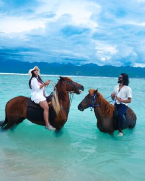 Bhavini Purohit Instagram - Golden hour, ocean breeze, and a ride into the sunset—just us, the waves, and our horses in paradise w/ @wonderfulindonesia 
.
{Travel ,trend,island,couple,couplevideos,gilliT,love,experiences,crazy}
.
#influencer #love #crazy #experience #bali #gilliislands  #trending #trend #love #balitrip #beach #beachlife #horse #horseriding