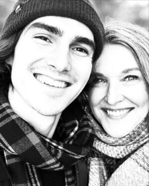 Brenda Strong Instagram - Running like h#ll from 2024 into 2025 w/ my sons!❣️@zaknotwack and #hapiboi 🐾