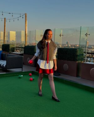 Charlotte Nicdao Instagram - Mythic Quest Season Four starts THIS WEDNESDAY. Please enjoy one serious photo of @danadelaney @claytonhawkins and @lucywarrenstyle ‘s good work, followed by a very silly lawn bowls photo shoot nobody asked for.