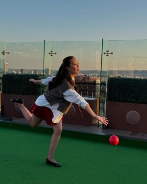 Charlotte Nicdao Instagram - Mythic Quest Season Four starts THIS WEDNESDAY. Please enjoy one serious photo of @danadelaney @claytonhawkins and @lucywarrenstyle ‘s good work, followed by a very silly lawn bowls photo shoot nobody asked for.
